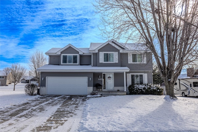 view of front of property with a garage