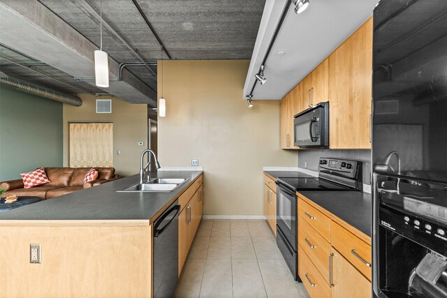 kitchen featuring kitchen peninsula, sink, black appliances, hanging light fixtures, and light tile patterned flooring