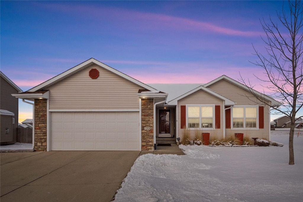 ranch-style house with a garage