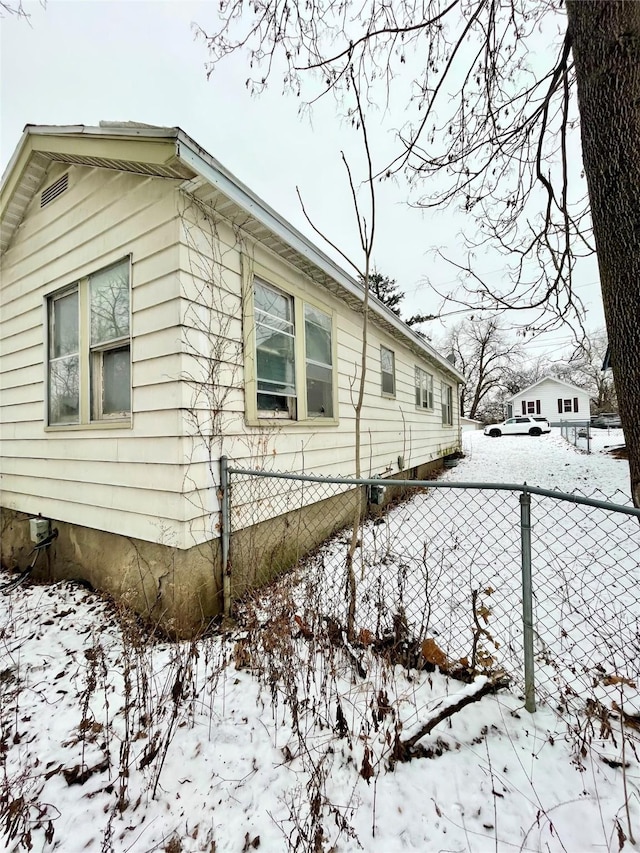 view of snow covered property