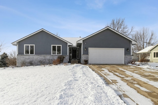 single story home featuring a garage