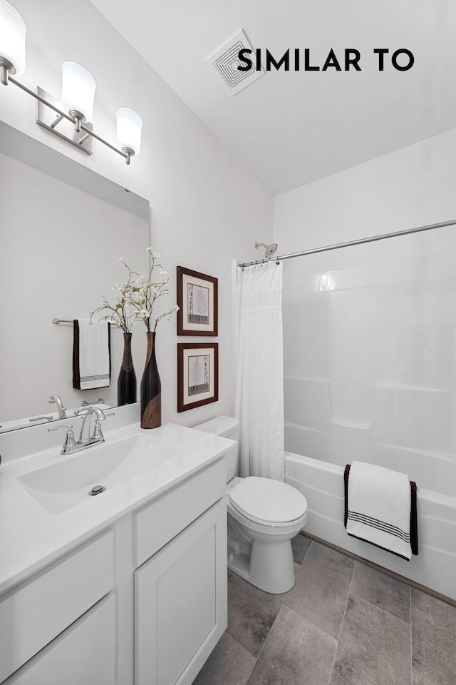 full bathroom with vanity, toilet, and shower / tub combo with curtain