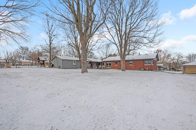 view of yard covered in snow