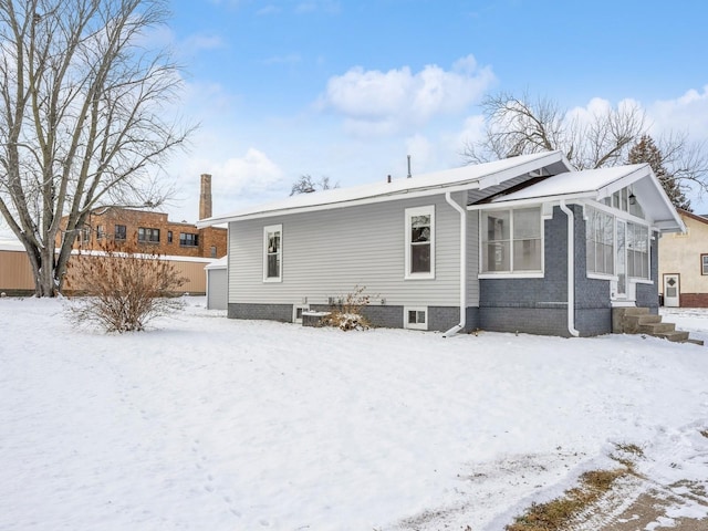 view of snow covered property