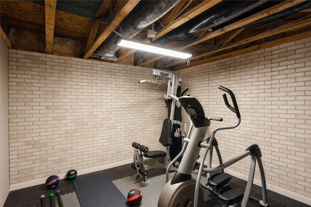 exercise area with brick wall