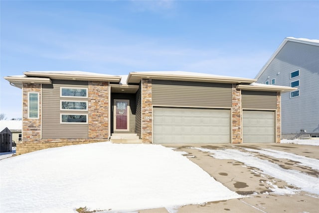 view of front of property with a garage