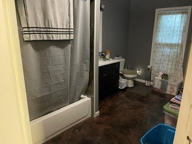 full bathroom with toilet, vanity, and shower / tub combo with curtain