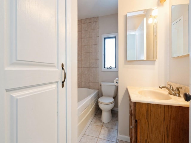 bathroom with tile patterned floors, vanity, and toilet