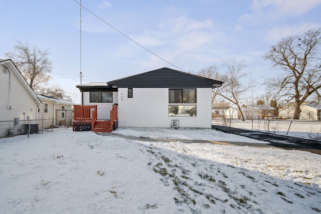 view of snow covered house