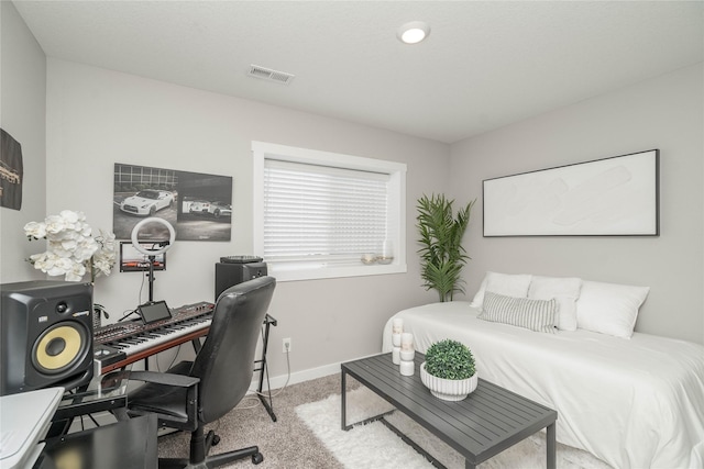 bedroom with light carpet