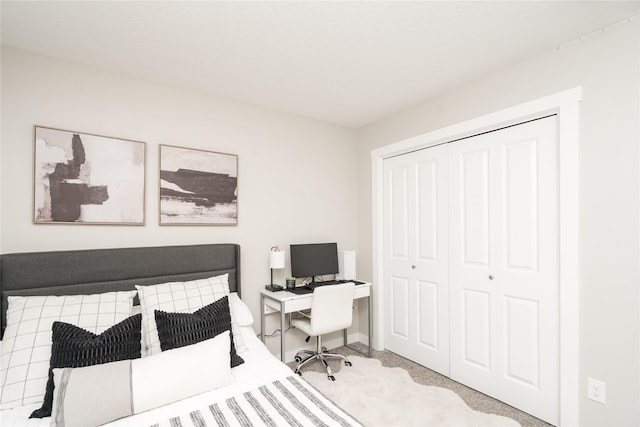 carpeted bedroom with a closet