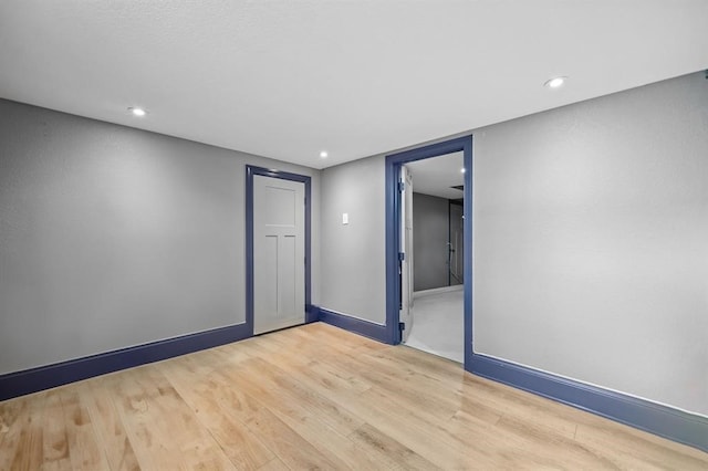 unfurnished room featuring light wood-type flooring