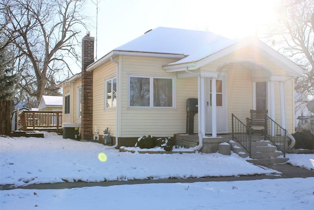 bungalow with central AC unit