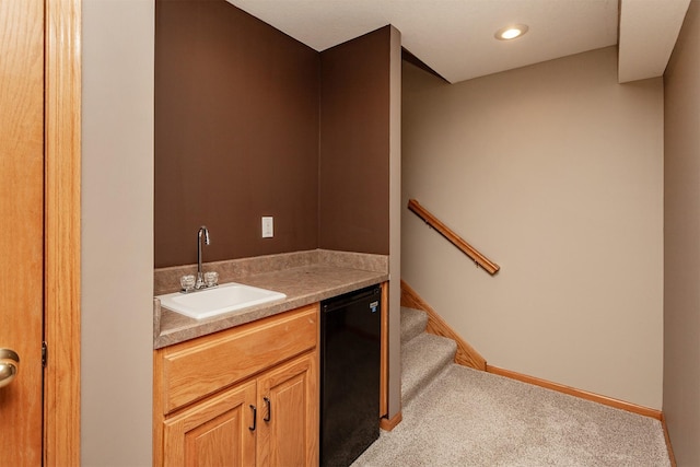 bathroom with recessed lighting, vanity, and baseboards