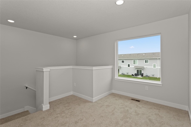 230 NW Waverly Dr, Waukee, IA 50263 - spare room with carpet flooring, baseboards, and recessed lighting