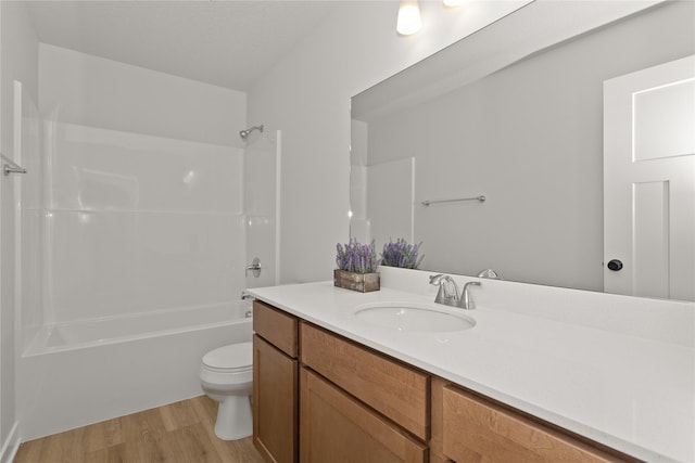 230 NW Waverly Dr, Waukee, IA 50263 - full bathroom with vanity, wood finished floors, toilet, and bathtub / shower combination