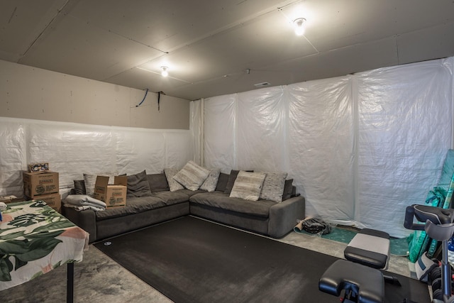 living room with concrete flooring