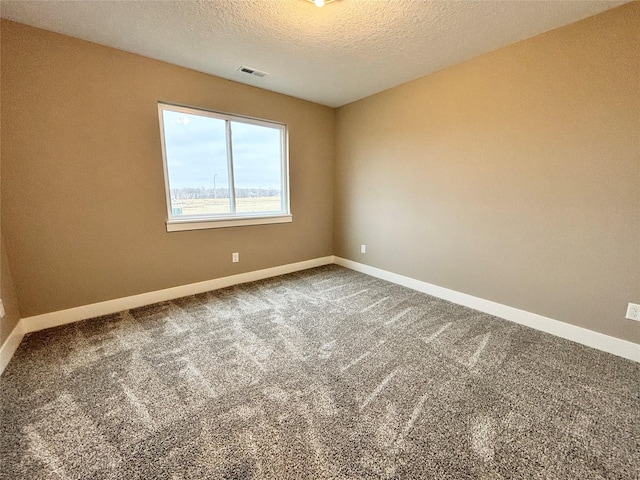 1677 20th Ave SE, Altoona, IA 50009 - carpeted empty room featuring baseboards and a textured ceiling