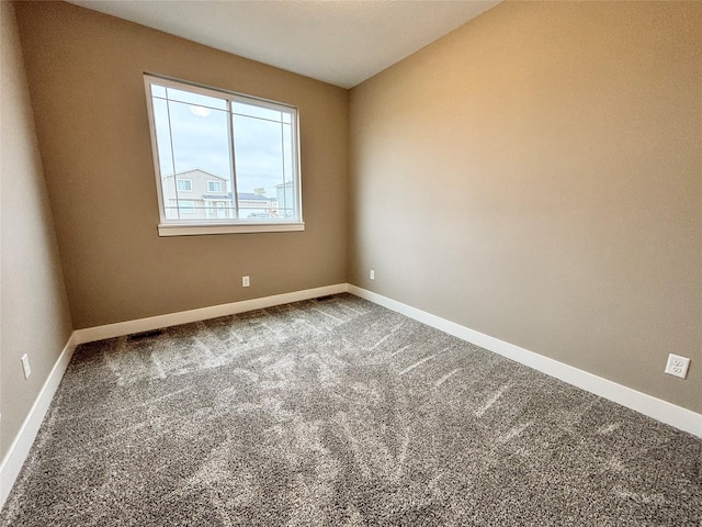 1677 20th Ave SE, Altoona, IA 50009 - spare room with carpet and baseboards