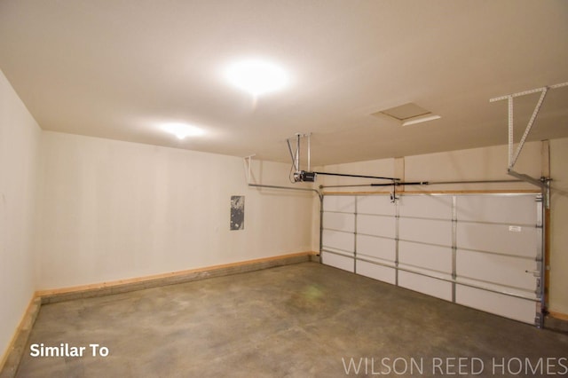 garage featuring baseboards and a garage door opener