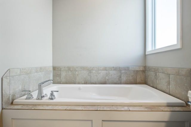 bathroom with a washtub