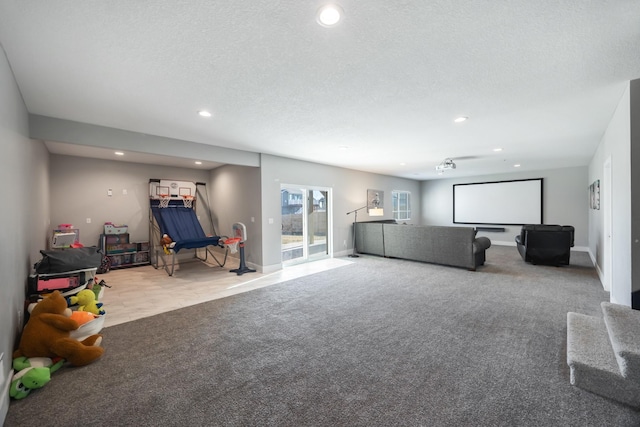 carpeted living room with a textured ceiling