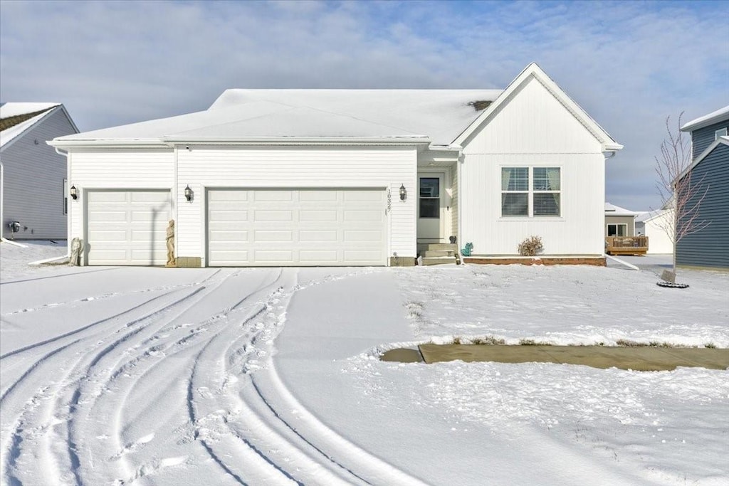 single story home with a garage