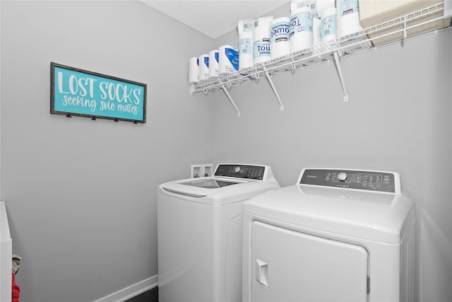 washroom with washer and clothes dryer