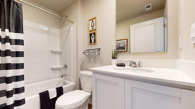 full bathroom with vanity, shower / tub combo with curtain, and toilet