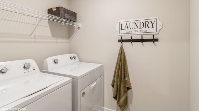 laundry area featuring laundry area and washing machine and dryer