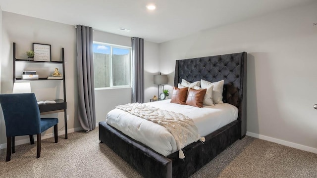 bedroom with recessed lighting, light colored carpet, visible vents, and baseboards