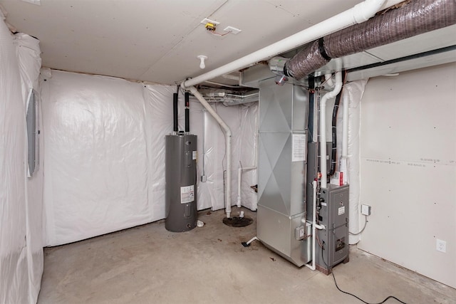 2503 Shaw St, Des Moines, IA 50317 - unfinished basement with electric water heater and heating unit