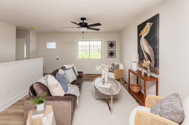 2503 Shaw St, Des Moines, IA 50317 - living area with light wood finished floors, ceiling fan, and baseboards