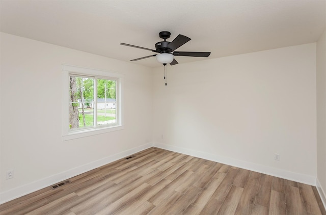 2503 Shaw St, Des Moines, IA 50317 - empty room with ceiling fan, light wood finished floors, and baseboards
