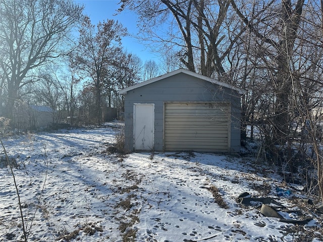 view of snow covered garage