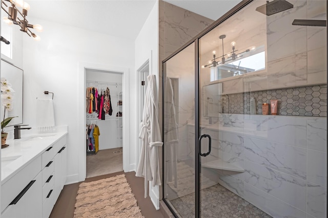 bathroom with vanity and an enclosed shower