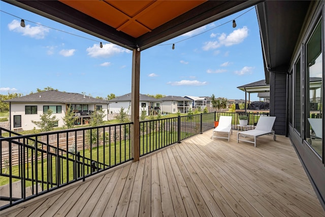 wooden deck with a yard