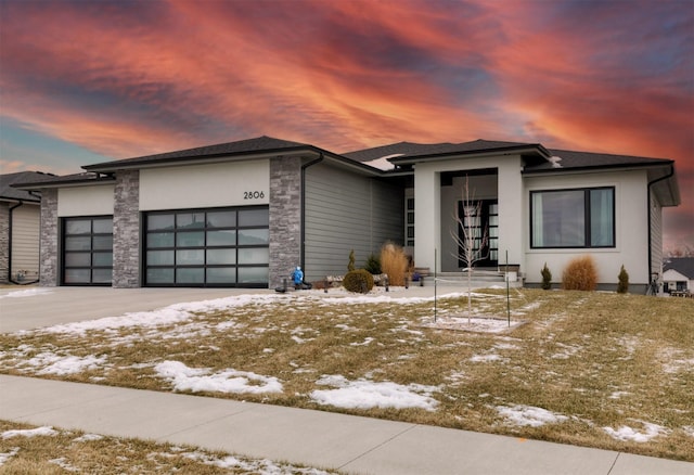 prairie-style home with a garage