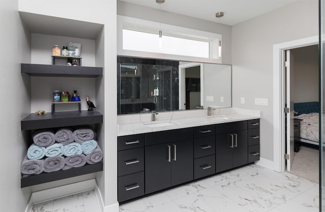 bathroom featuring vanity and an enclosed shower