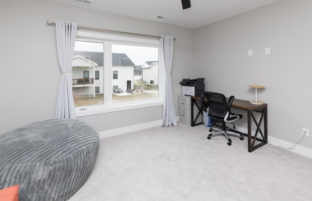 carpeted office featuring a wealth of natural light