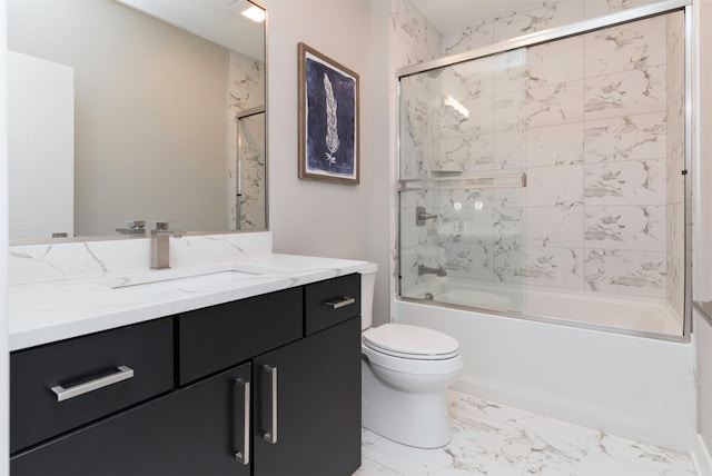 full bathroom with vanity, toilet, and bath / shower combo with glass door