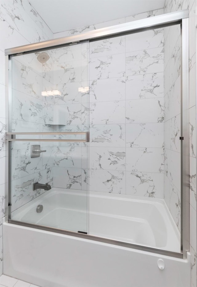 bathroom featuring enclosed tub / shower combo