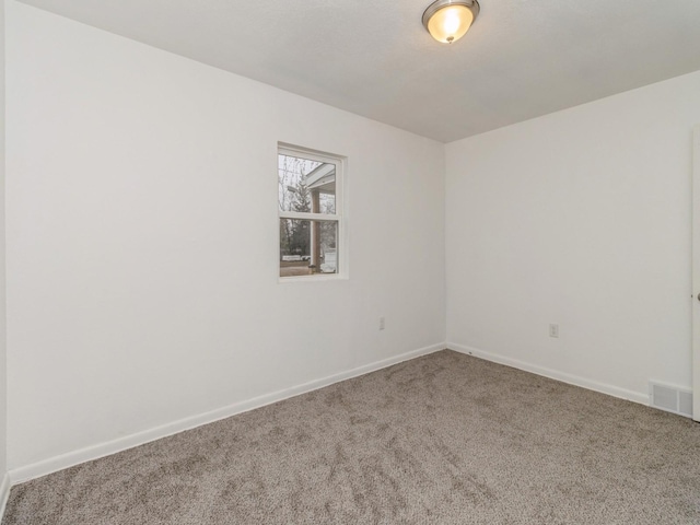 view of carpeted spare room