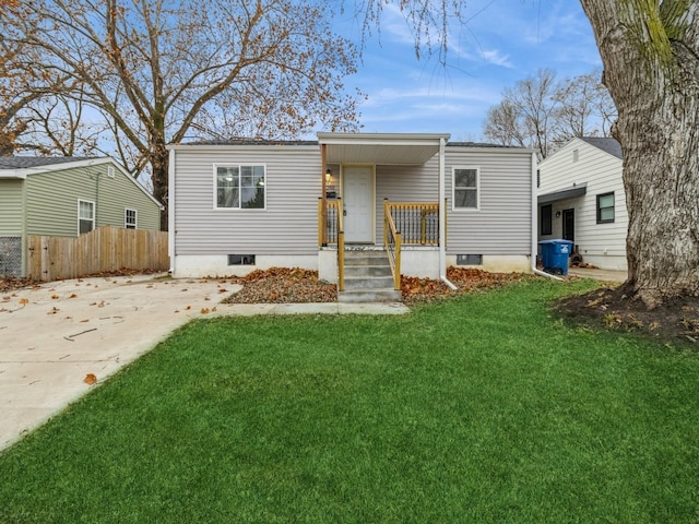 view of front of home with a front lawn