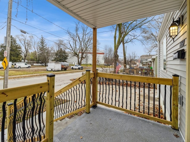 wooden terrace with covered porch