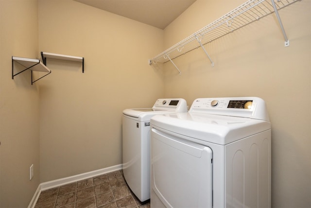 washroom featuring independent washer and dryer