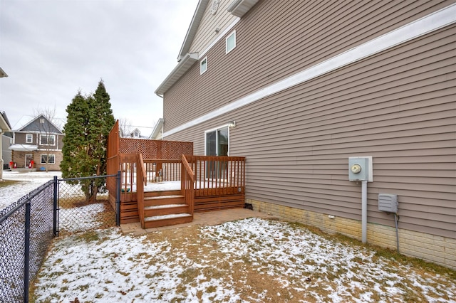 view of snow covered deck