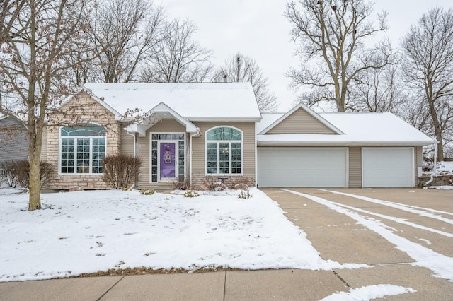 view of front of property with a garage