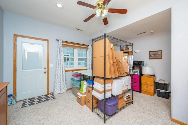 storage area featuring ceiling fan