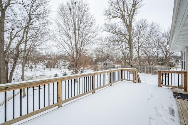 view of snow covered deck